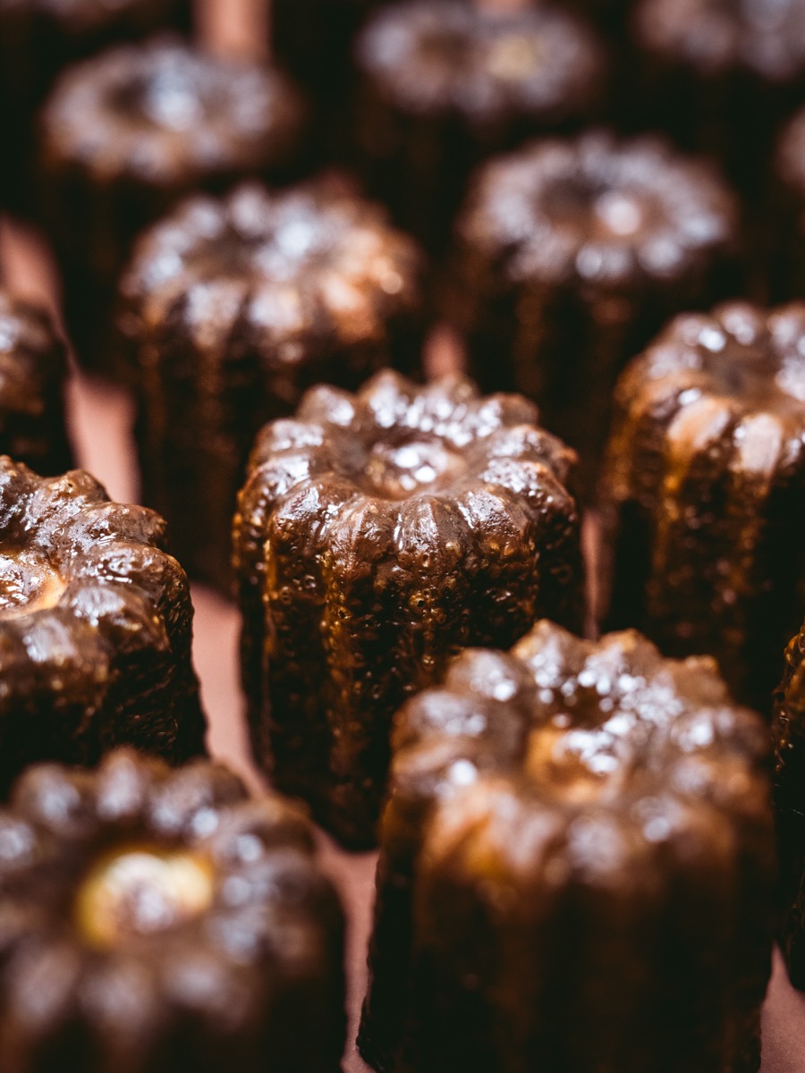 Freshly baked canelés at Santo Bakehouse, Malasaña Madrid